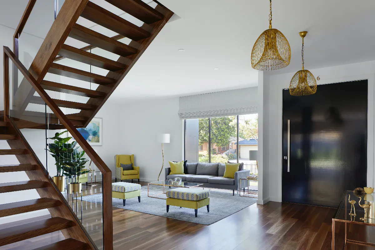 Luxury home interior - open plan entrance with bespoke staircase