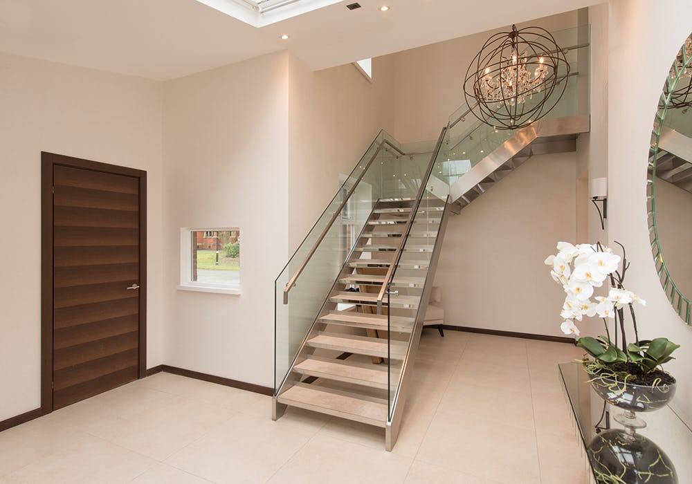 Staircase with wide custom internal door