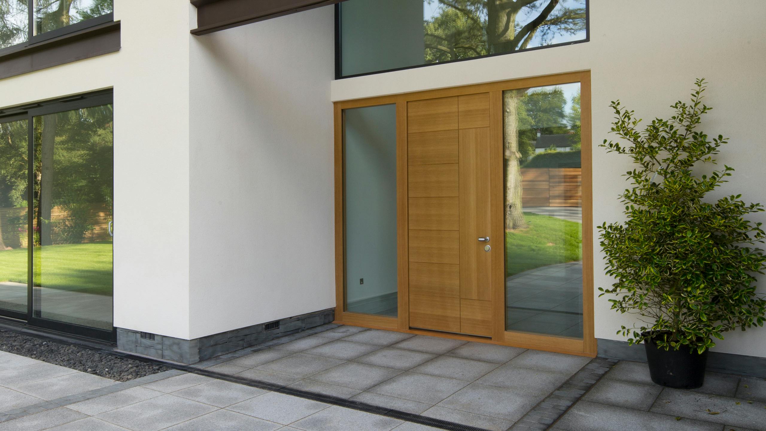 A house with a large wooden door.