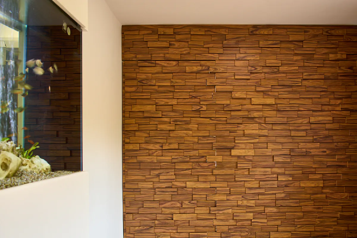 A concealed door - The door and surrounding wall surfaces -  finished in stacked timber blocks, creating texture and character.