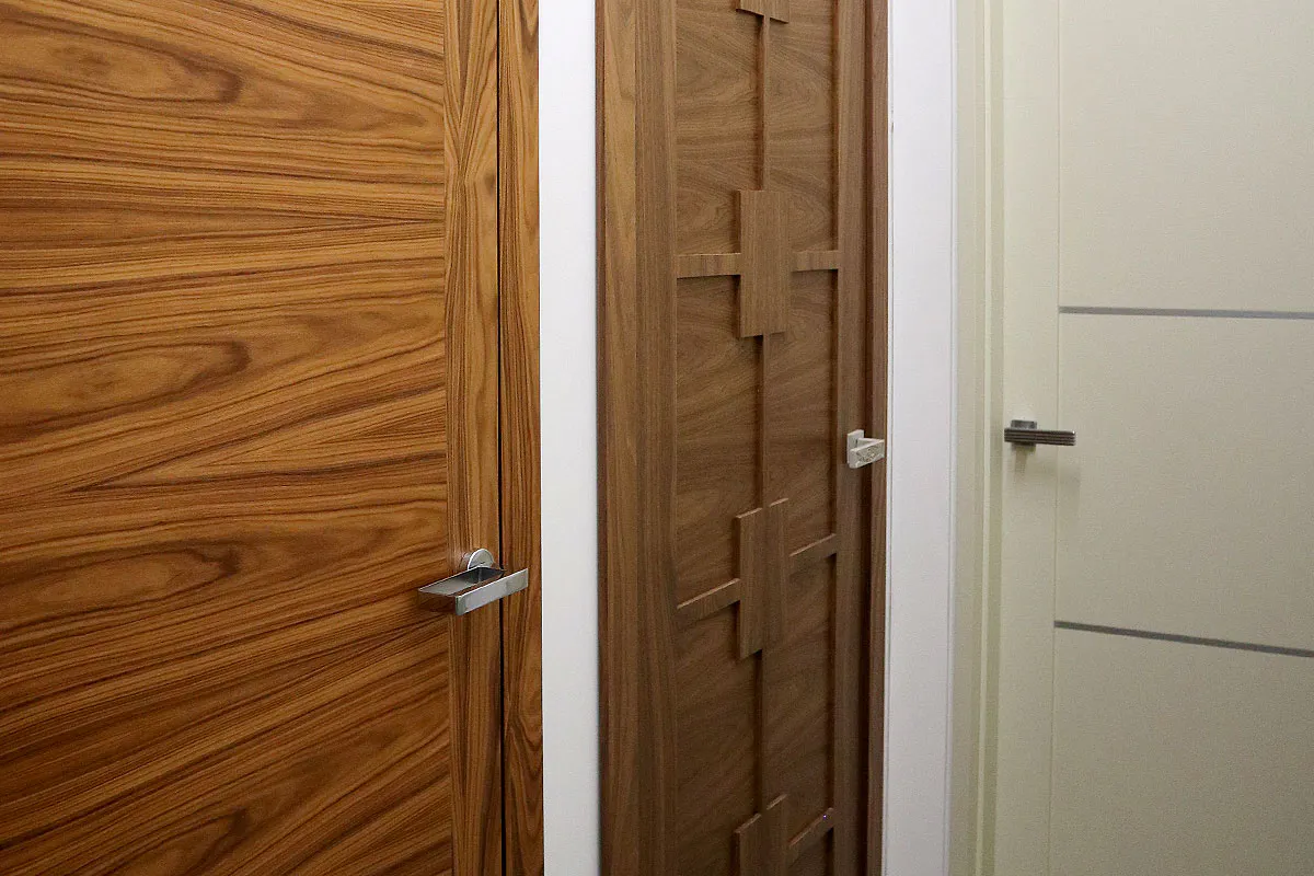 Deuren showroom - three of Deuren's bespoke door sets