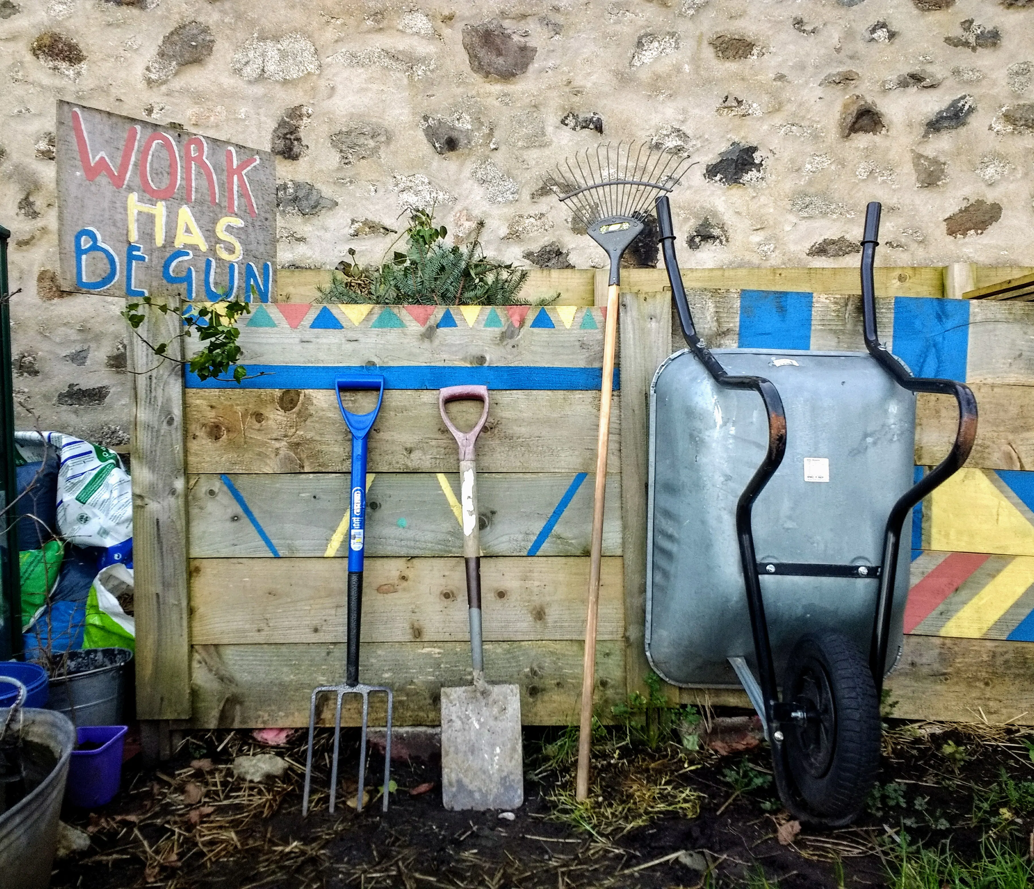A photo of the compost bins in Brander Community Garden