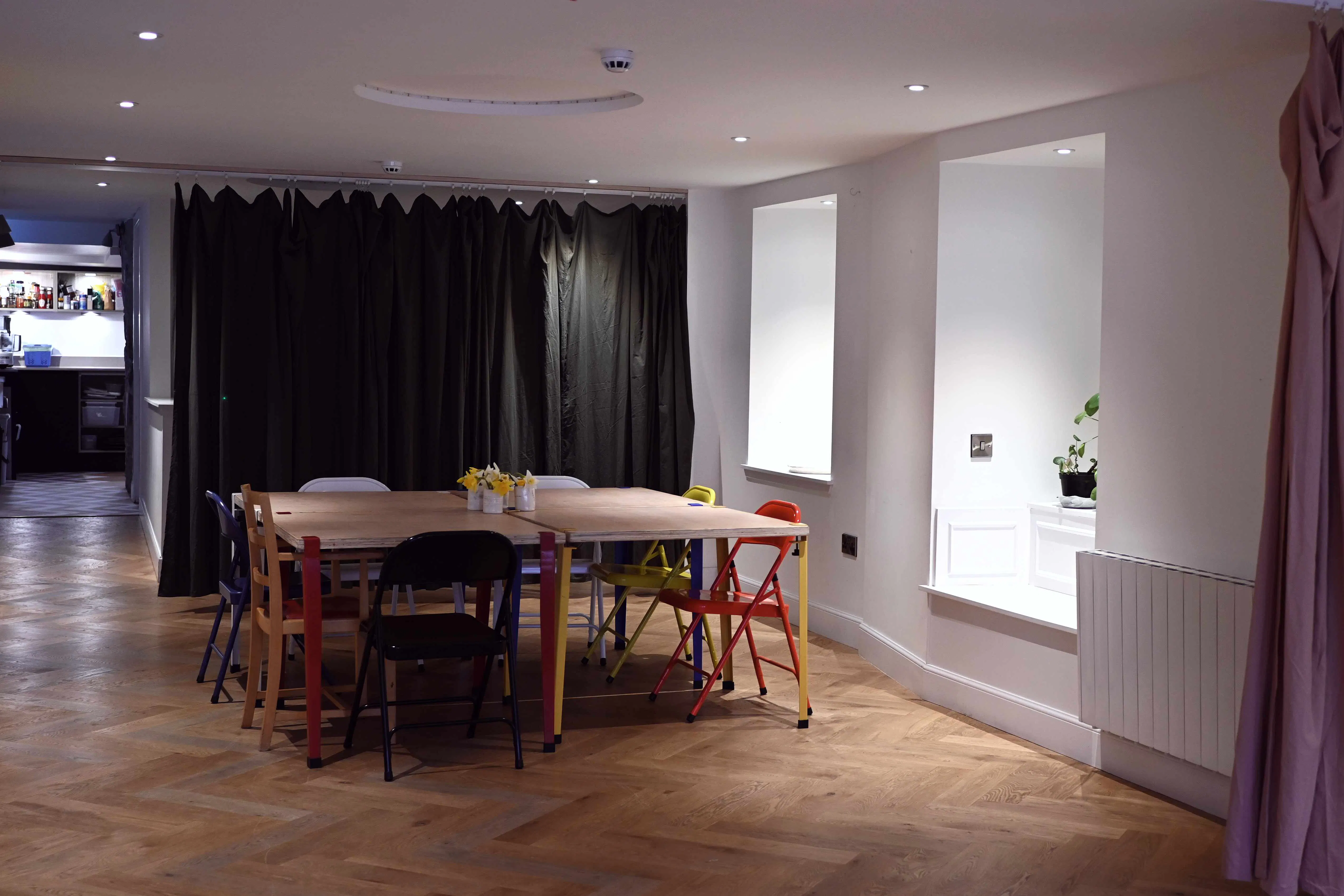 Meeting style set up inside the community hub. 