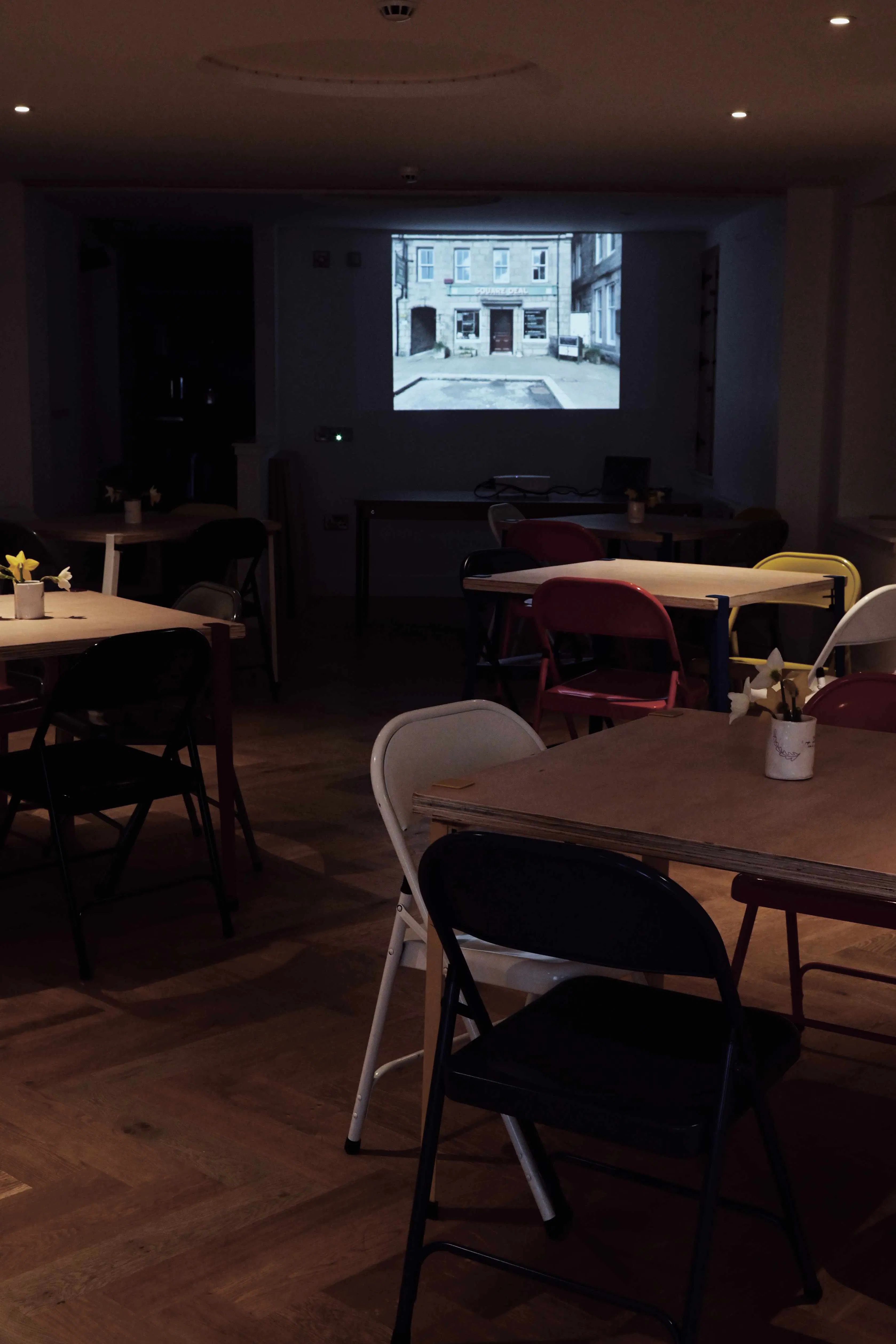 Informal film screening / presentation set up inside the hub