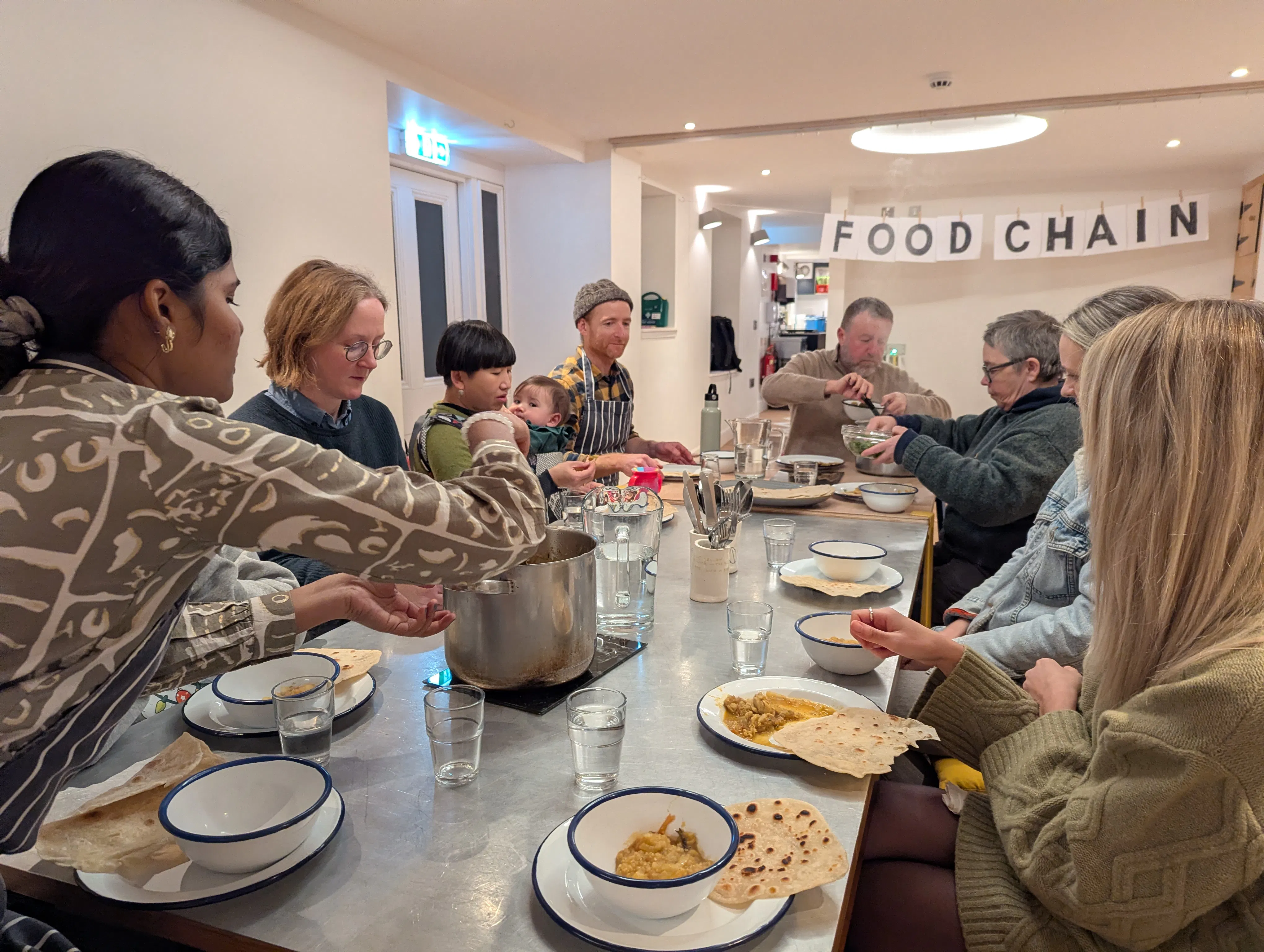 A photo of people sharing a meal