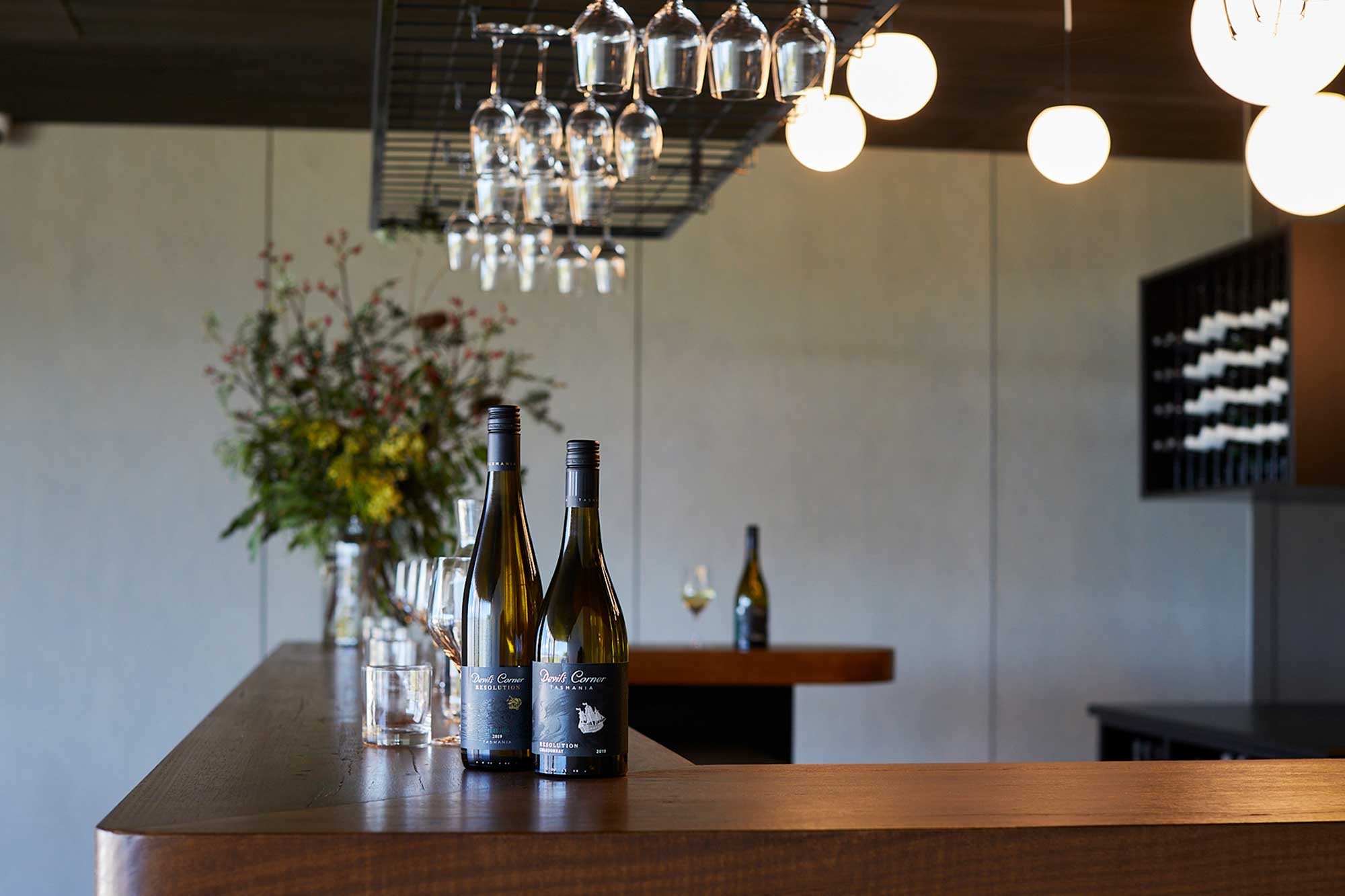 Two bottles of Devil's Corner wine on the counter in the Devil's Den