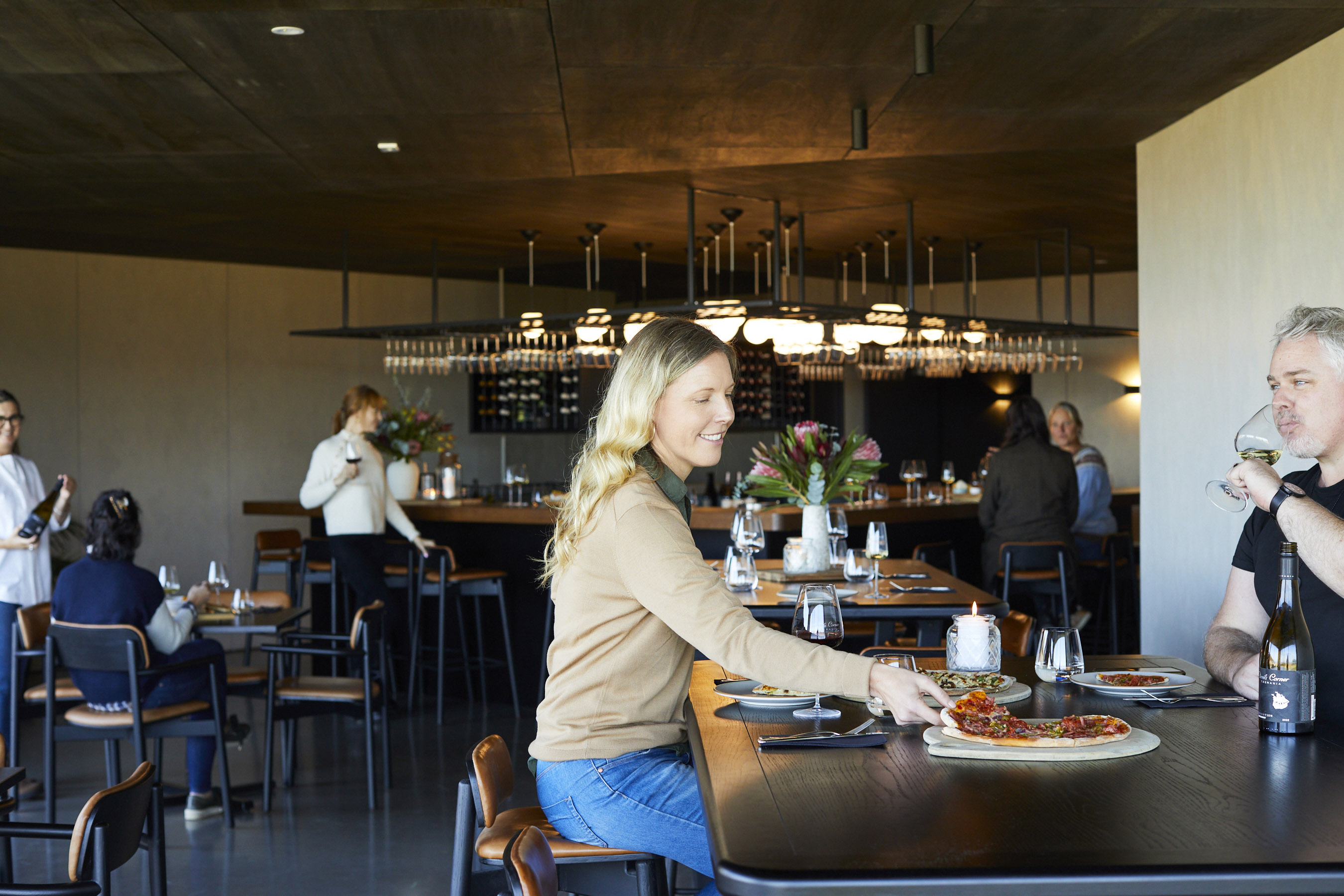 People enjoying food and wine in the Devil's Den