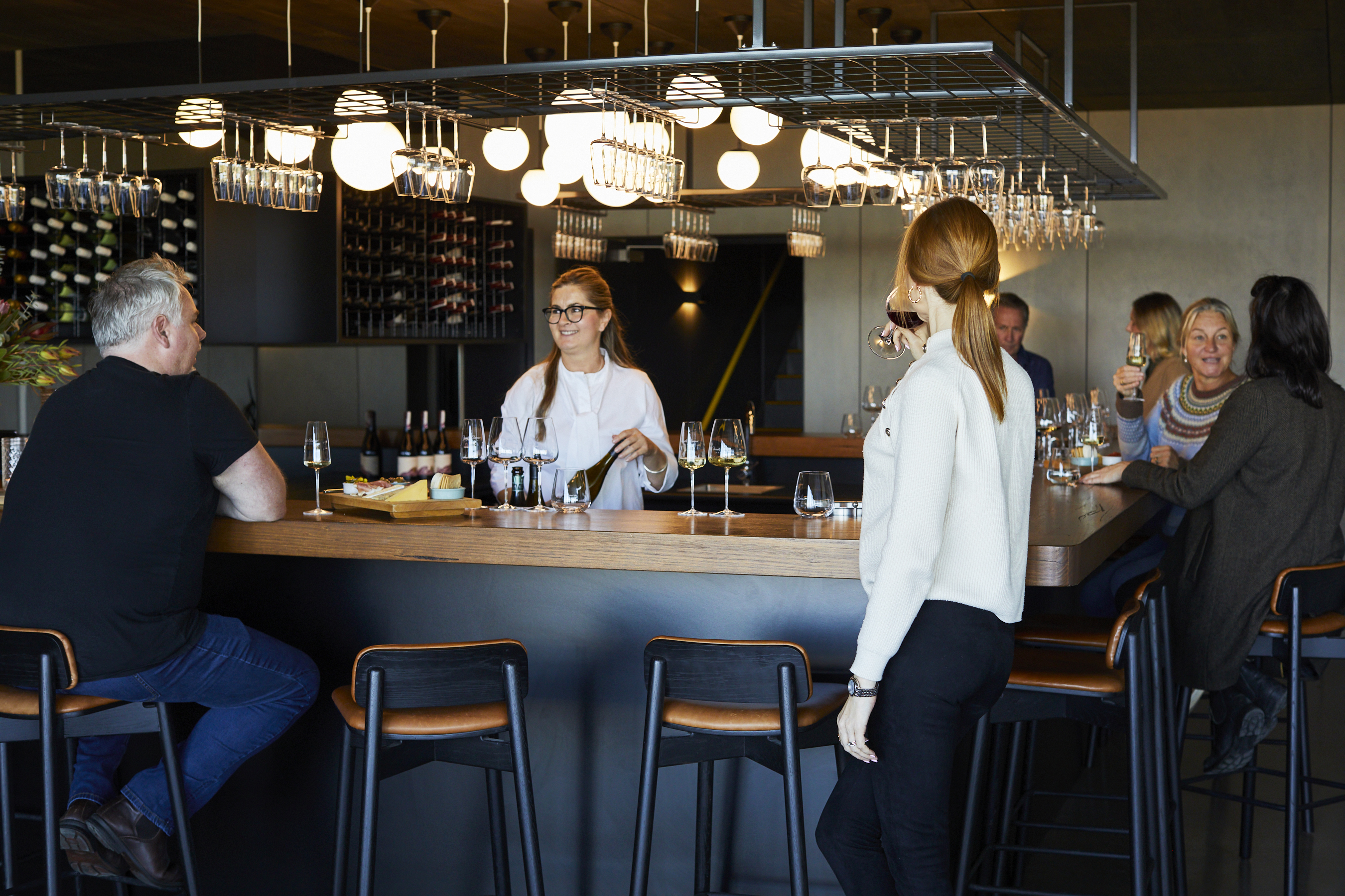 People enjoying food and wine in Devil's Den