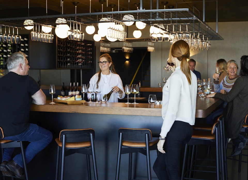 People enjoying food and wine in Devil's Den