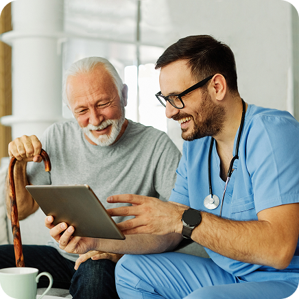 Healthcare provider consulting with a Medicare beneficiary in a clinical setting.