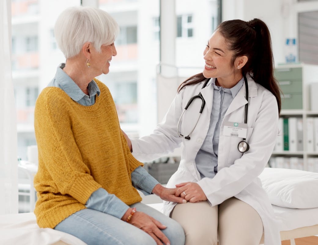 Doctor with patient in  for a consultation.