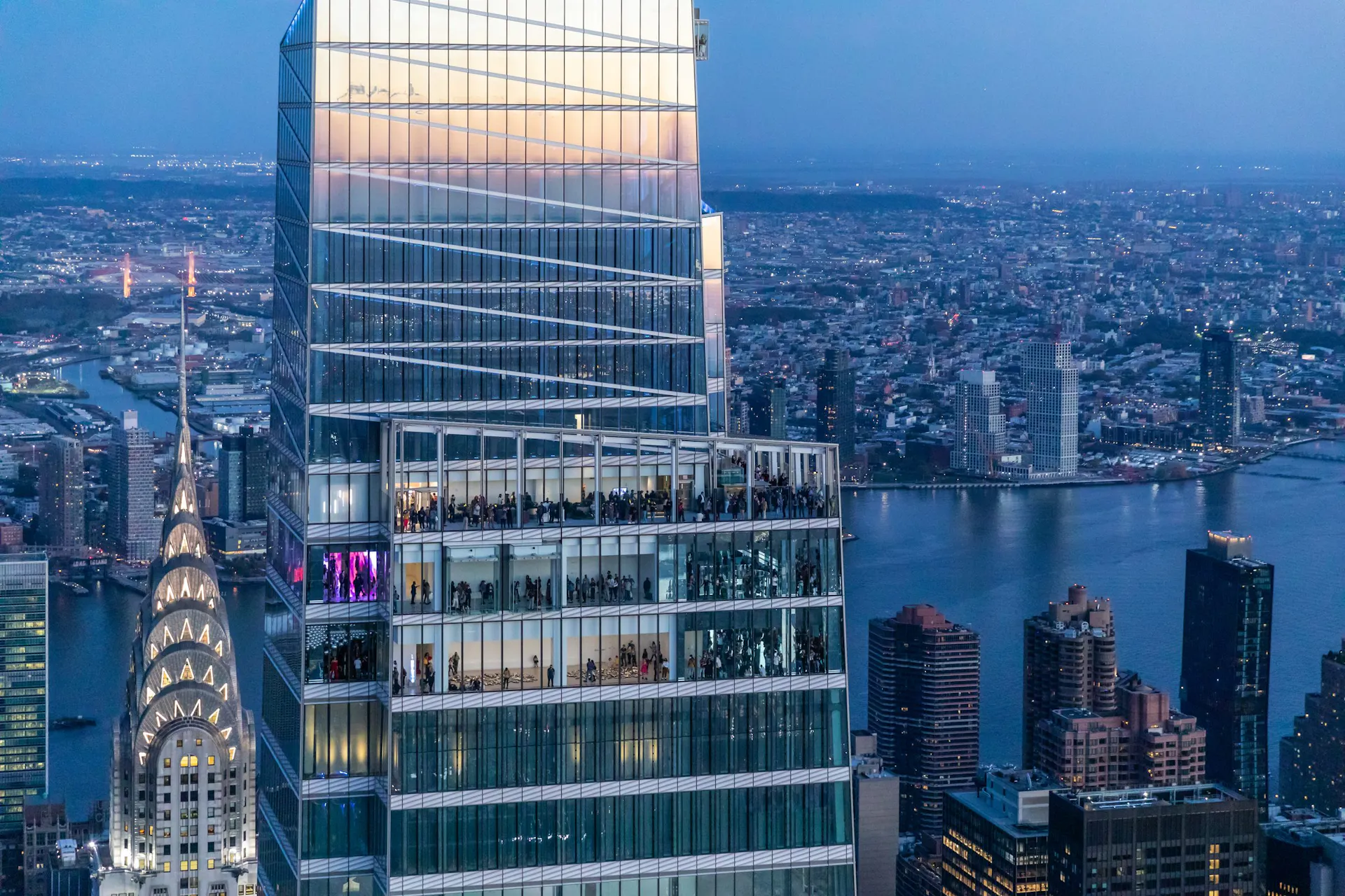 One Vanderbilt at dusk, with the SUMMIT floors lit above Midtown Manhattan