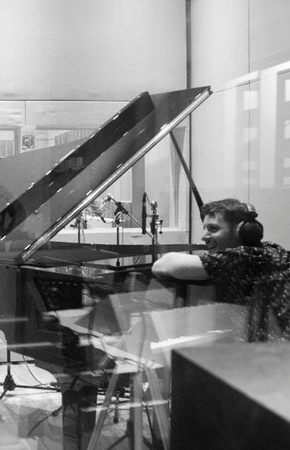 Ramiro Zayas is in the rehearsal room with a piano.