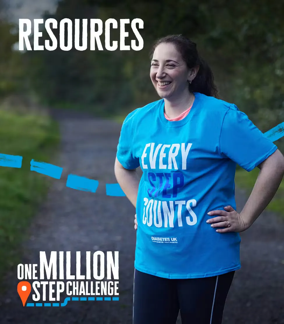 A person stands on a wooded trail wearing a bright blue “Every Step Counts” T‑shirt for the One Million Step Challenge.