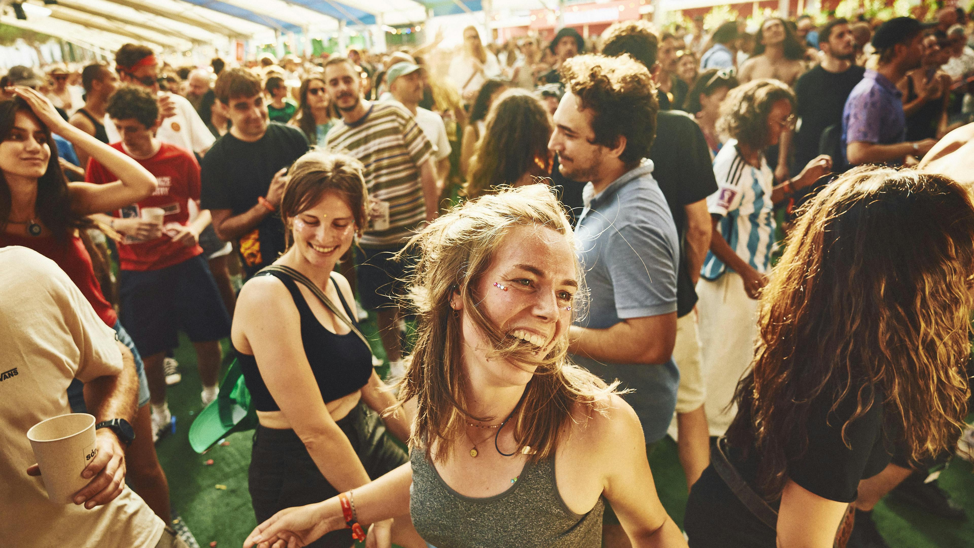 music fan having fun at a music festival in europe