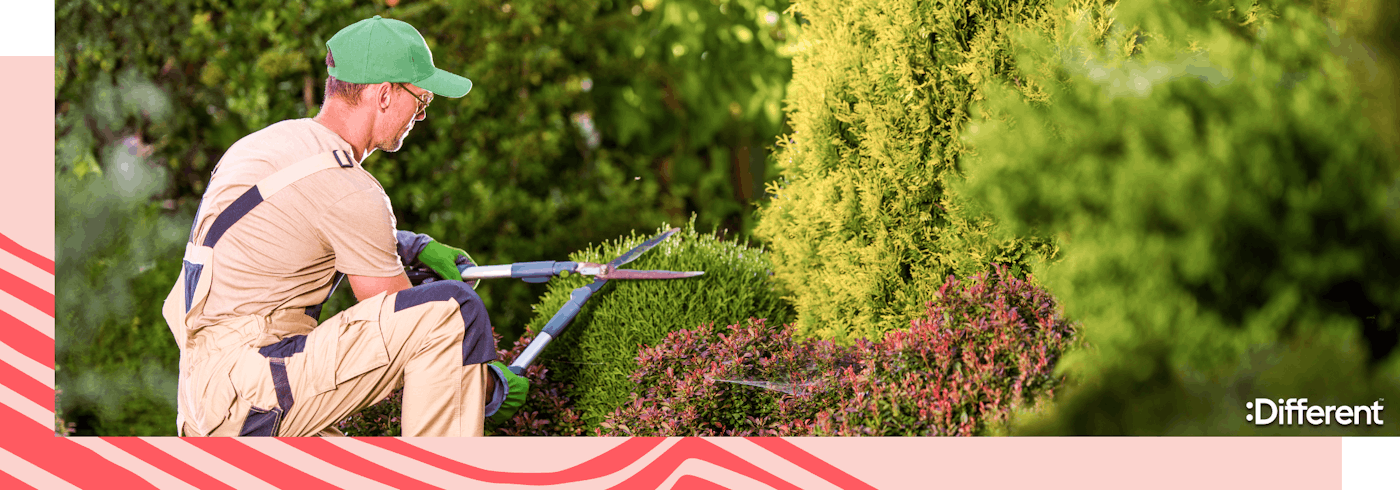 A man conducting landscape maintenance on a rental property