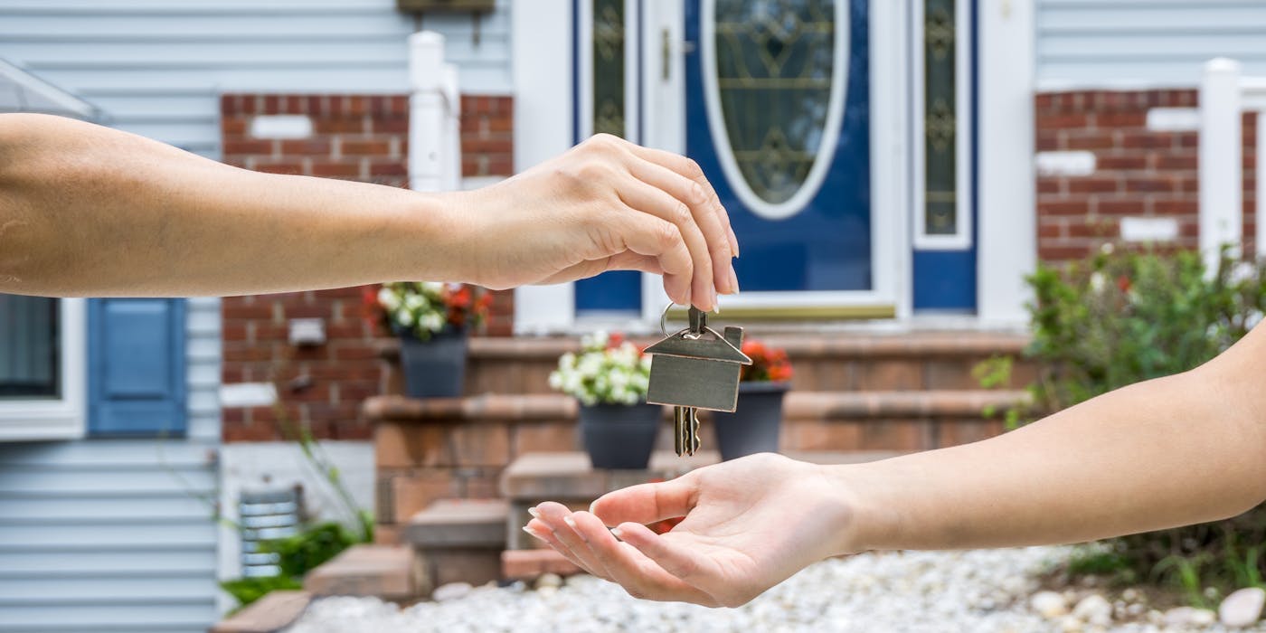 handing over keys to house