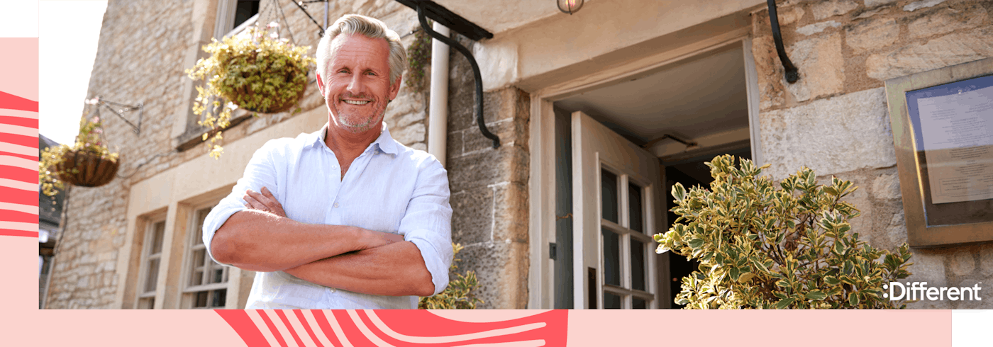 A landlord standing in front of his investment property