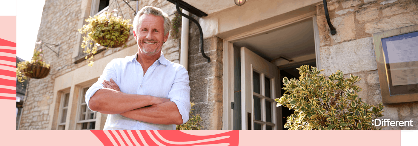 A landlord standing in front of his investment property 