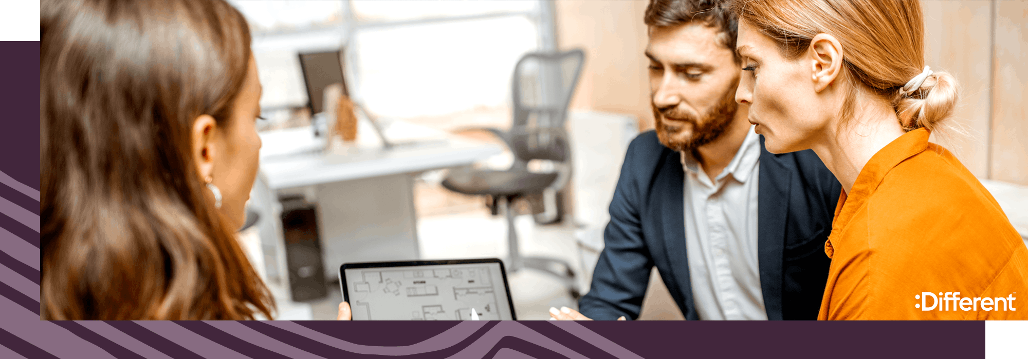 Real estate agents viewing a demo of property management software for their real estate agency