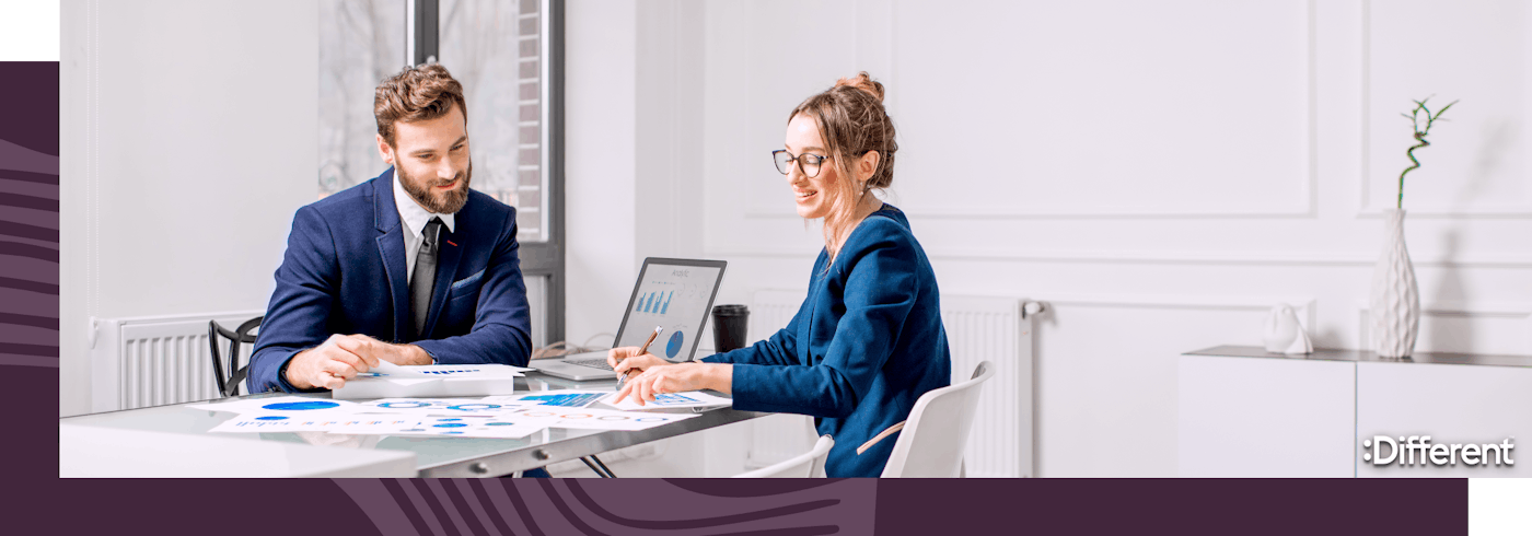 Two agency principals discussing real estate data