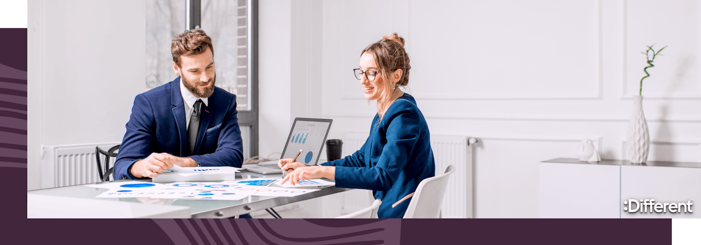 Two agency principals discussing real estate data 