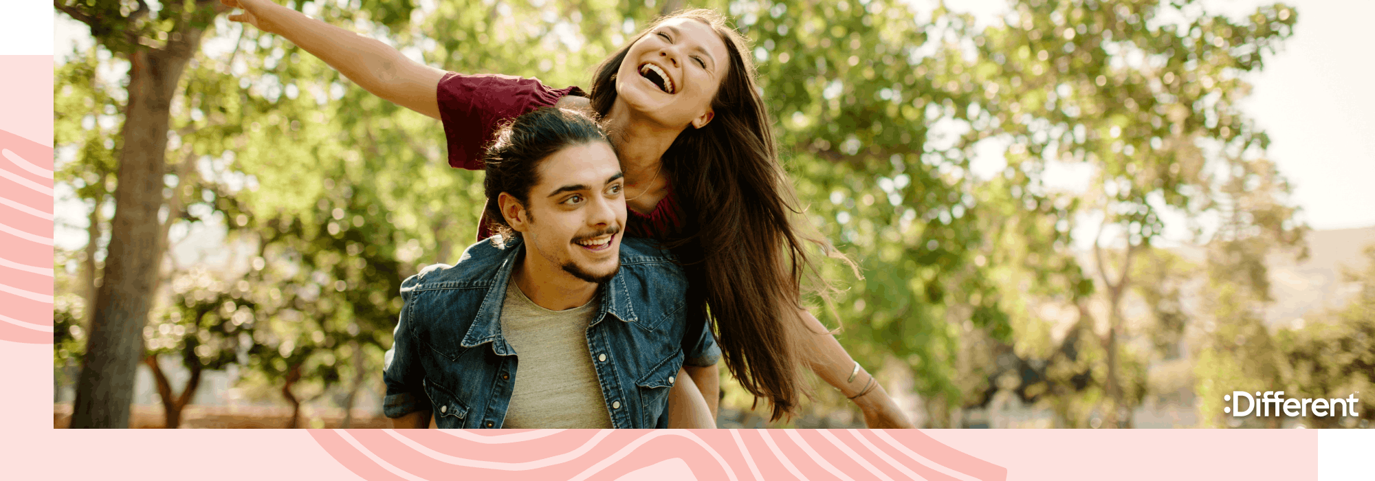 A young carefree couple enjoying time at a park