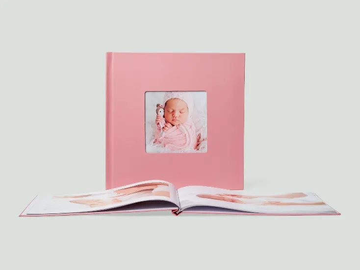 Fotolivro Classic aberto, spread com foto
