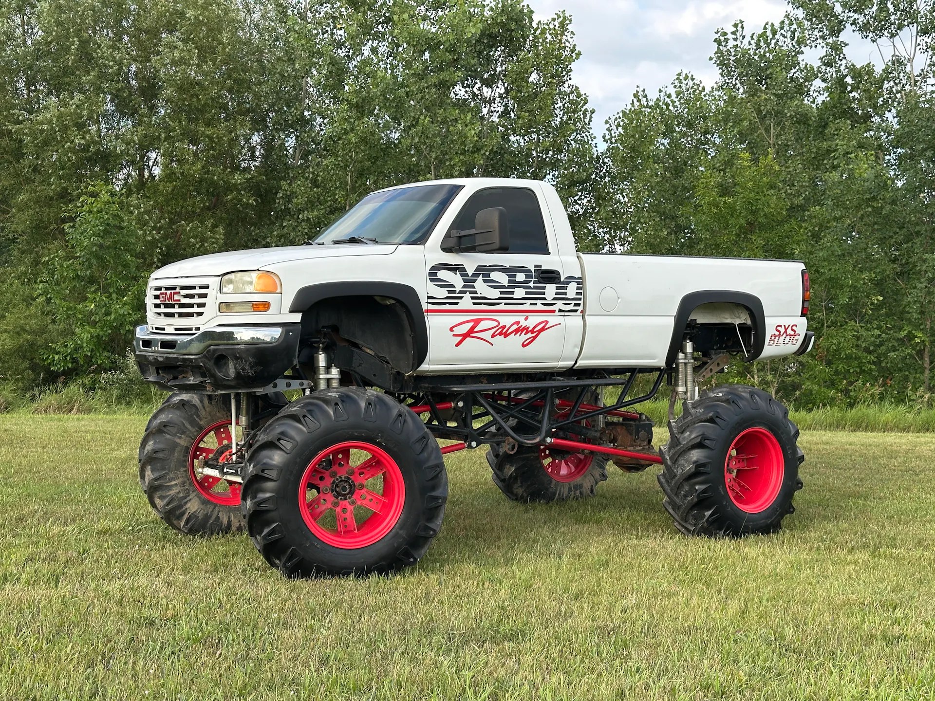 2004 GMC Sierra SXS Blog driver front 3/4 wide