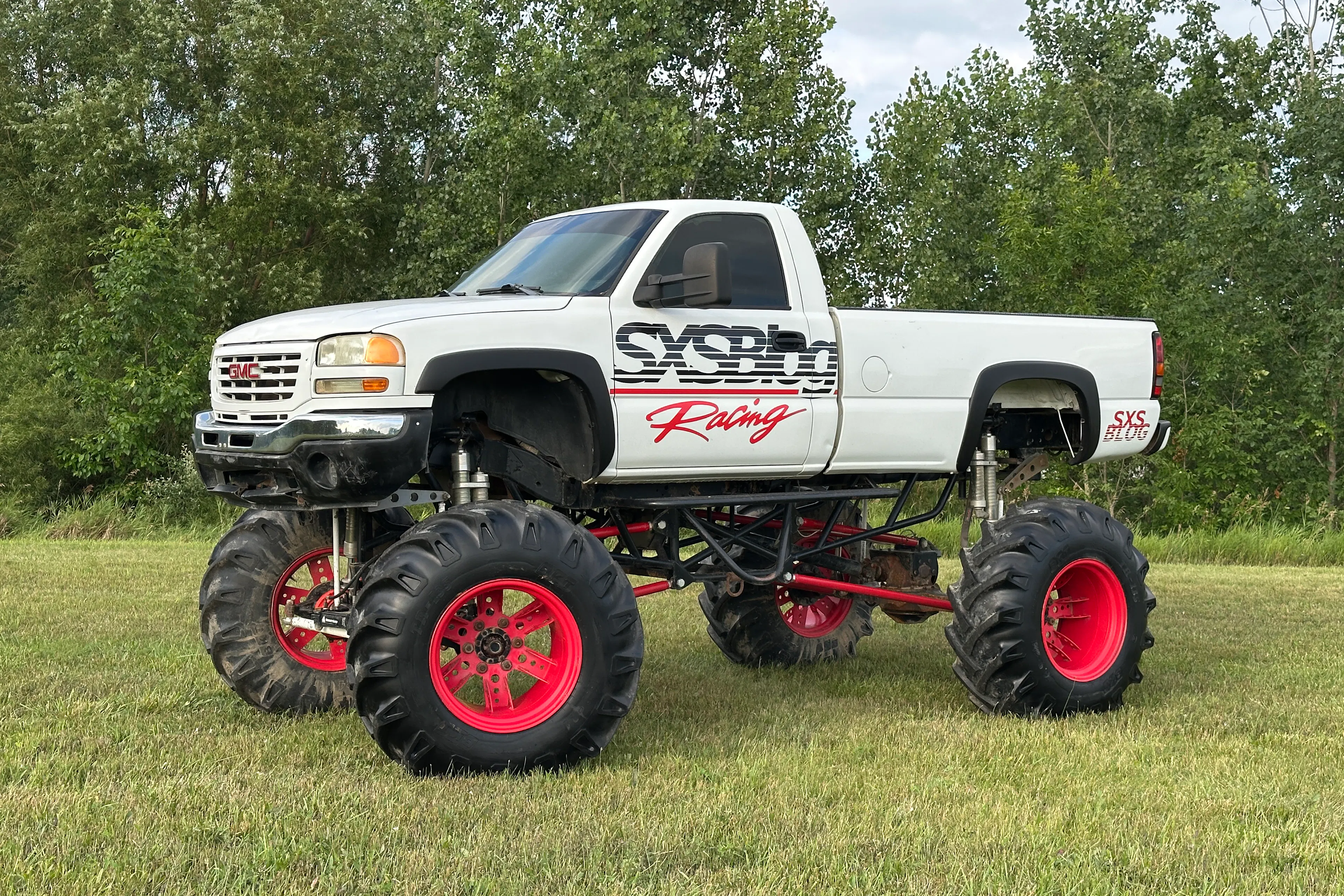 2004 GMC Sierra SXS Blog driver front 3/4 wide