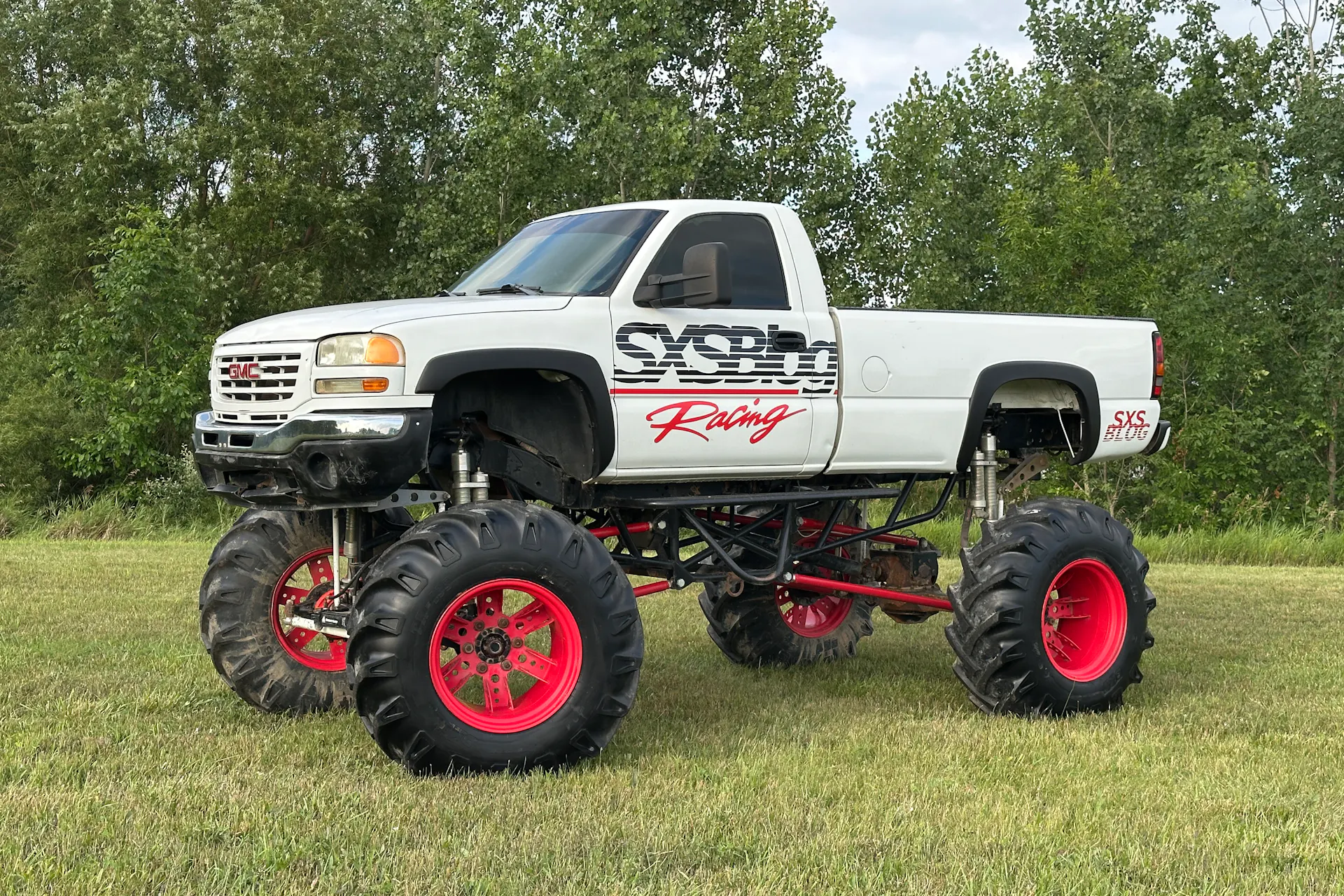 2004 GMC Sierra SXS Blog driver front 3/4 wide