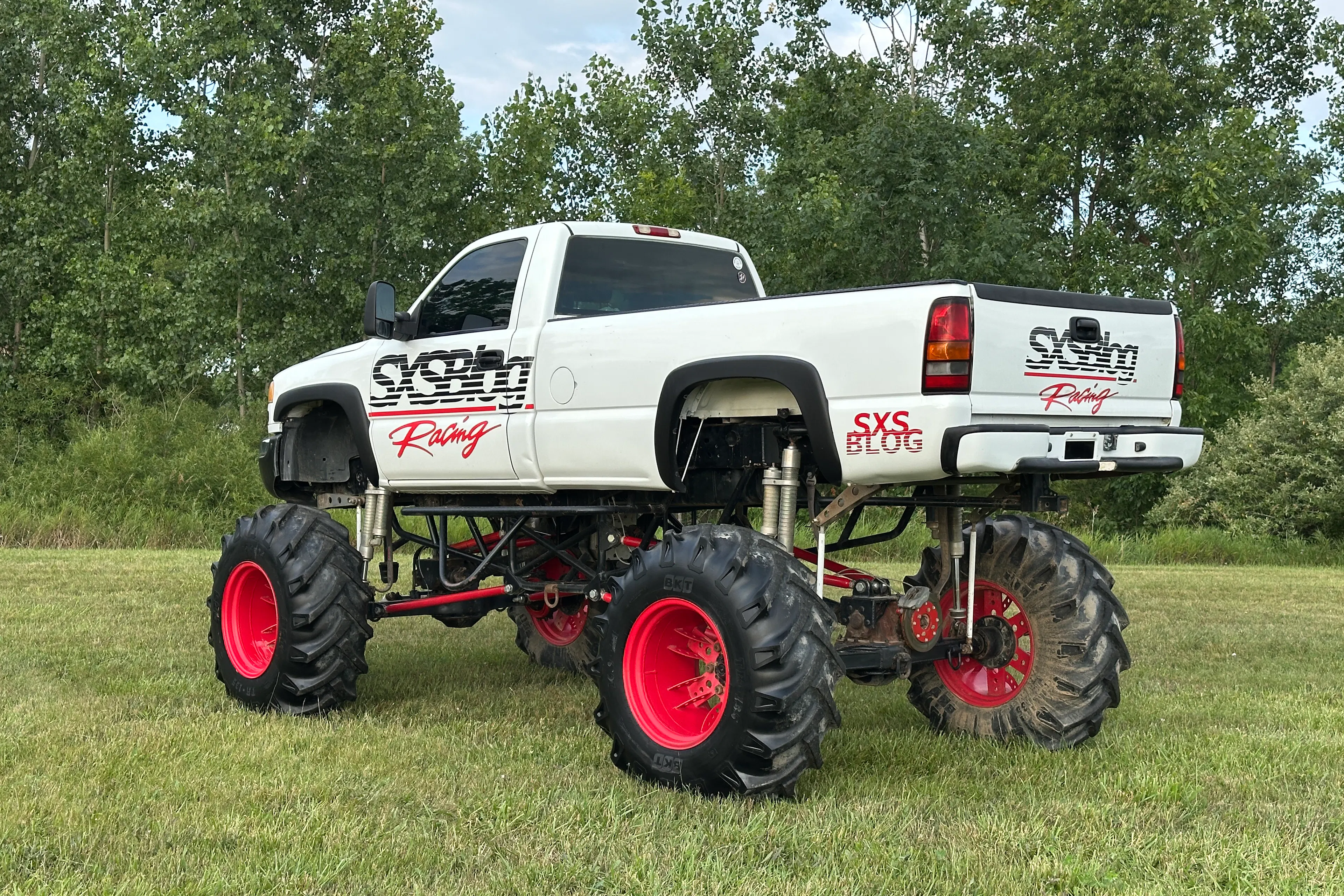 2004 GMC Sierra SXS Blog driver rear 3/4