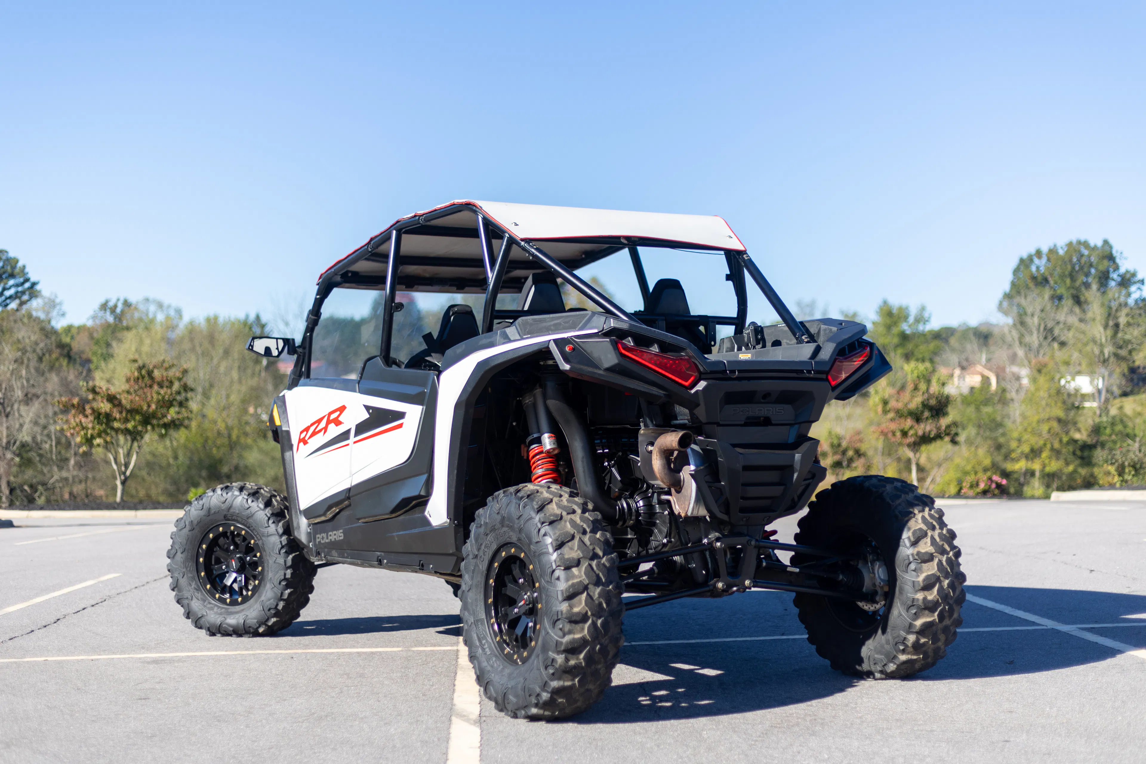 2024 Polaris RZR XP4 1000 Ultimate driver rear 3/4 tight low