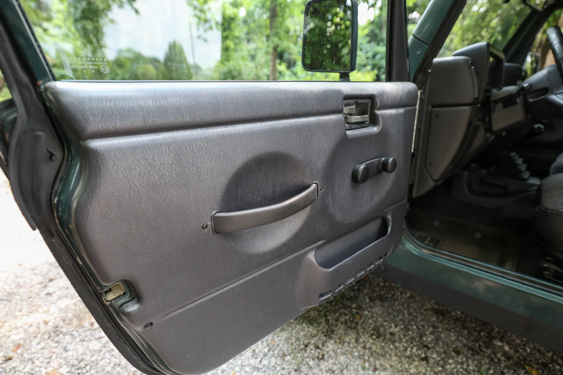 1999 Jeep Wrangler Sport driver door interior