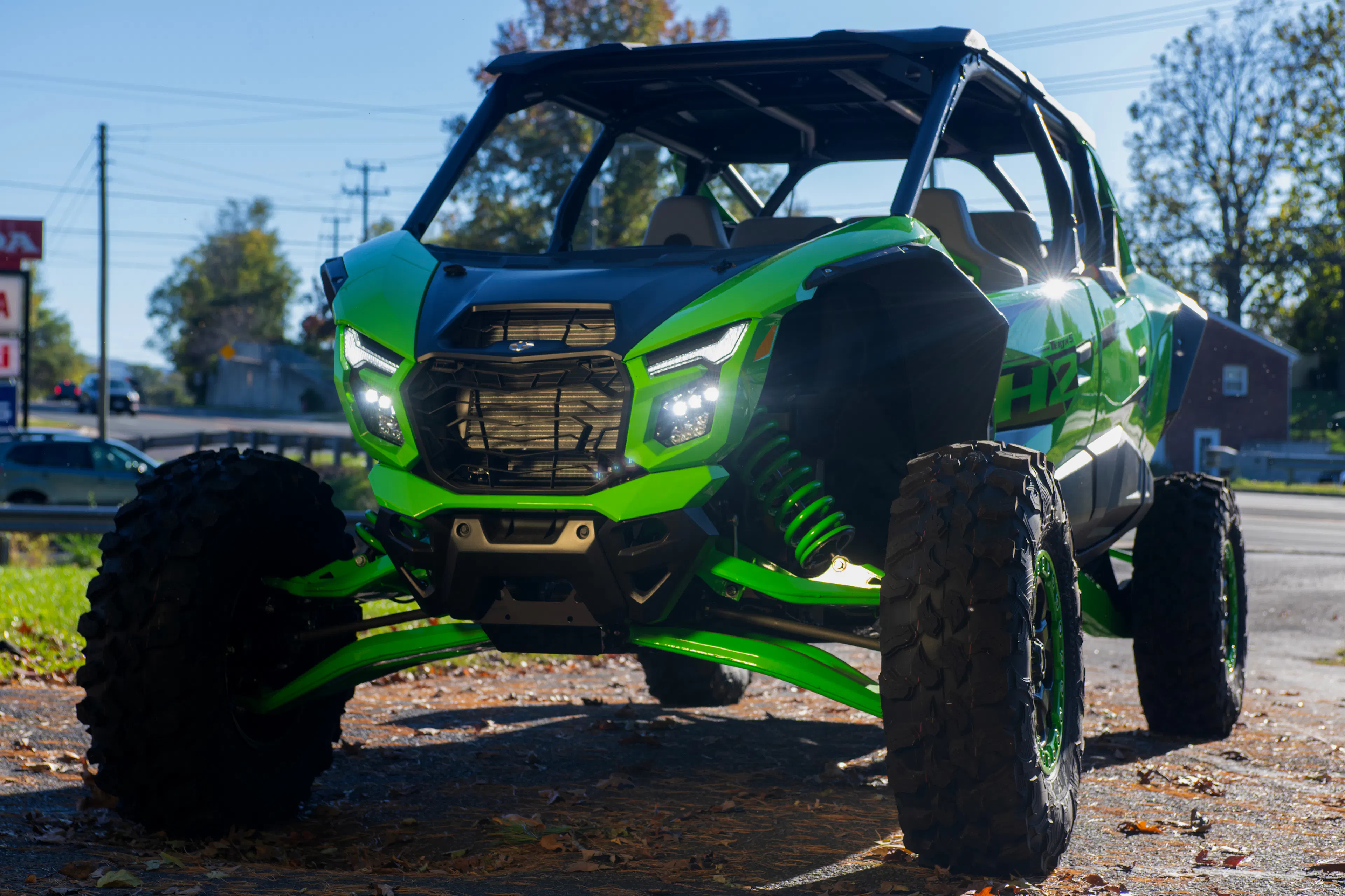 2026 Kawasaki Teryx5 H2 Deluxe driver front 3/4 lights on