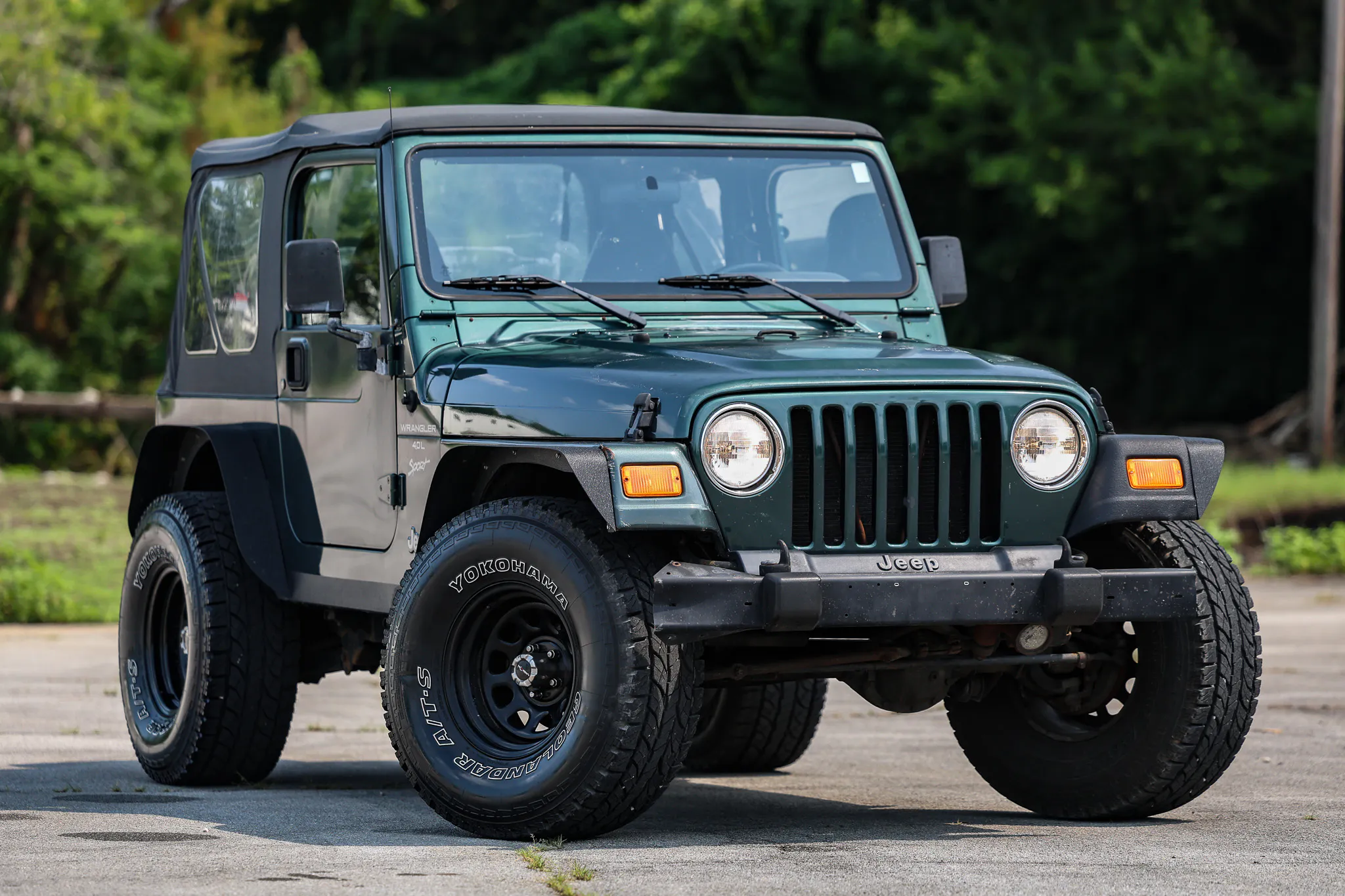 1999 Jeep Wrangler Sport passenger front 3/4 steep