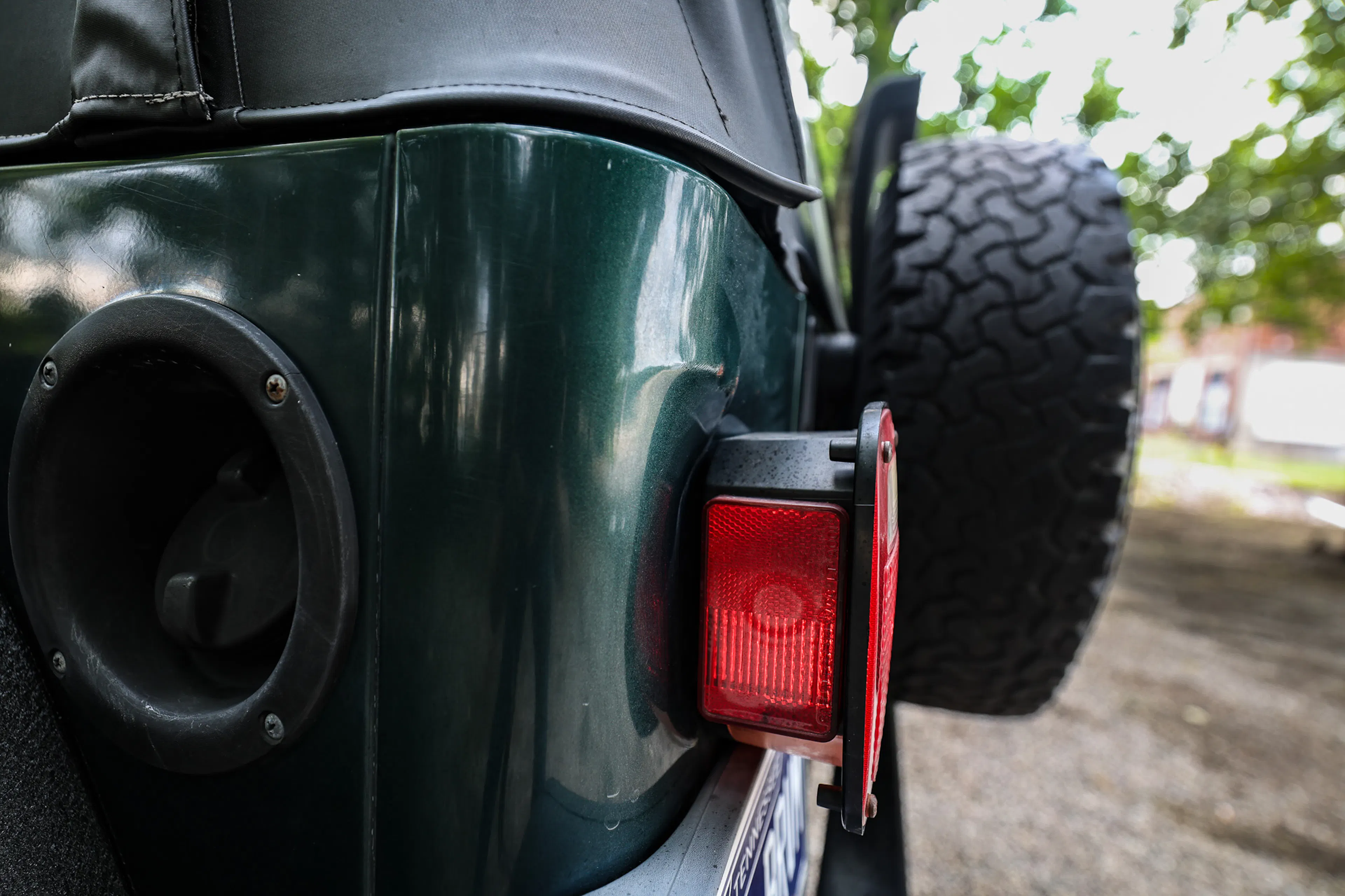 1999 Jeep Wrangler Sport driver taillight dent