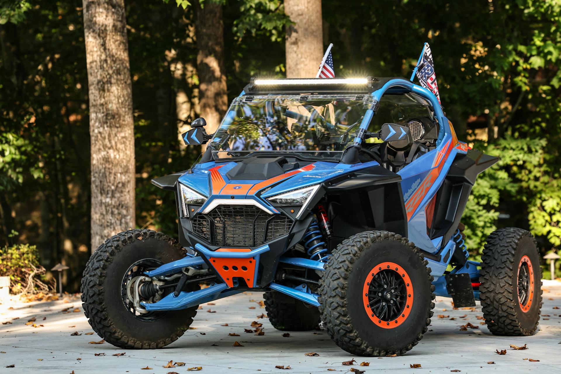 2023 Polaris RZR Pro R Troy Lee Designs Edition with lights on.