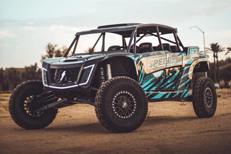 2025 speed utv el jefe with custom wrap at sunset.