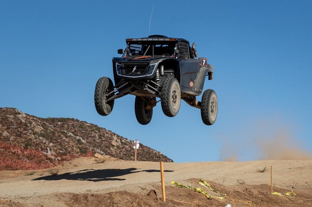 2025 speed utv baja bandit getting absolutely yeeted over a jump.
