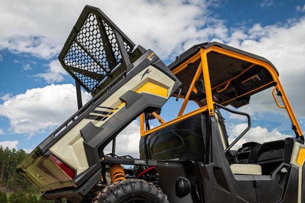 2025 arctic cat prowler with a headache rack in the dump bed.