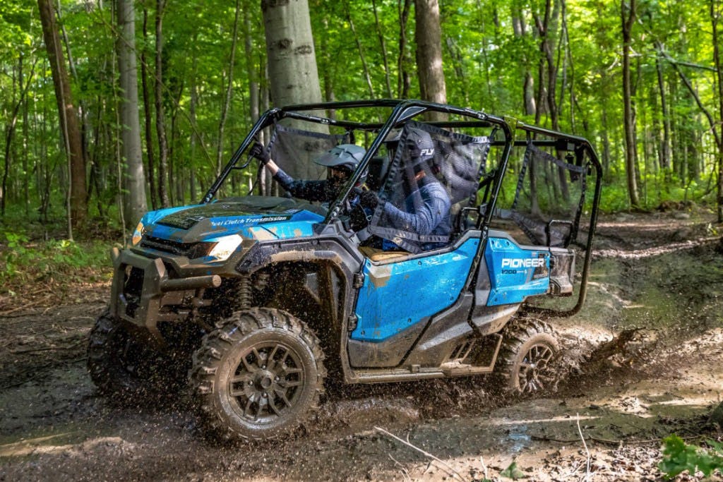 2025 honda pioneer 1000-5 in the mud