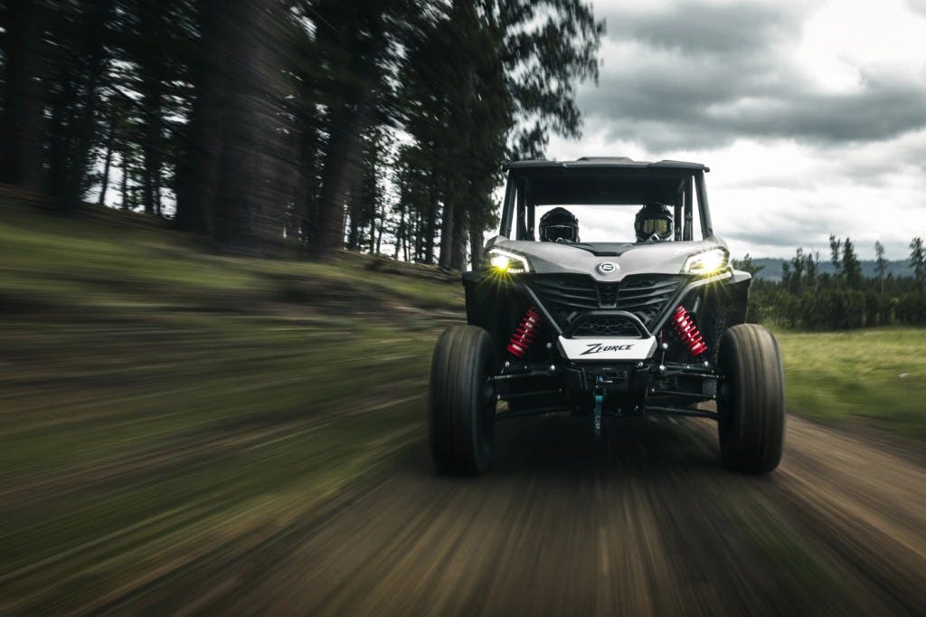 2025 CFMoto ZForce 950 Sport-4 speeding down a dirt trail.