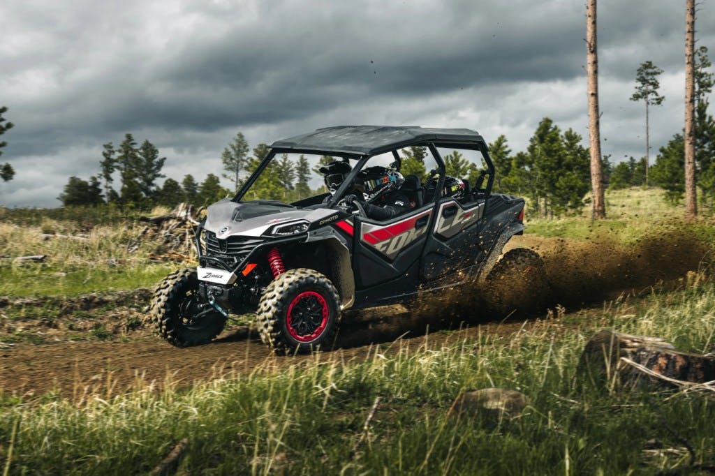 2025 CFMoto ZForce 950 Sport-4 with three passengers on a trail.