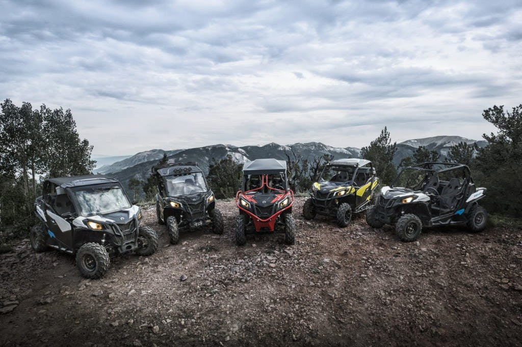 2025 Can-Am Maverick Sport lineup on a mountaintop.