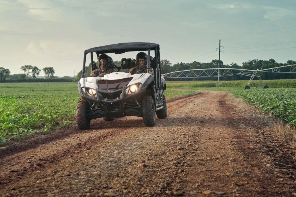 2025 yamaha viking VI ranch edition riding through an ag field.