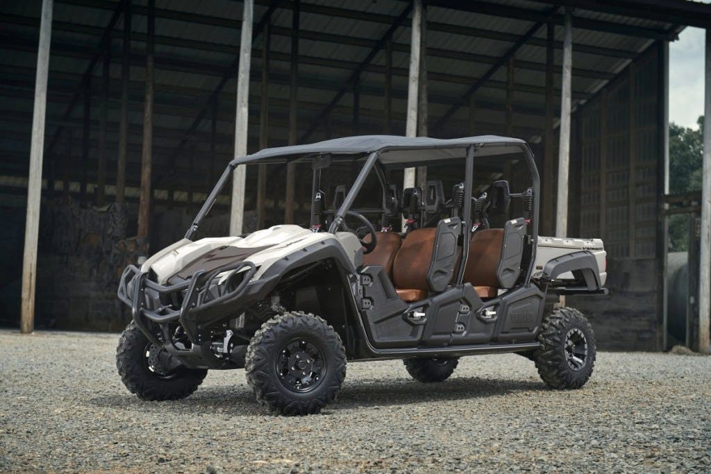 2025 yamaha viking VI ranch edition sitting outside a pole barn.