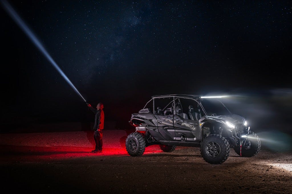 2025 kawasaki teryx krx4 1000 blackout edition parked at night.