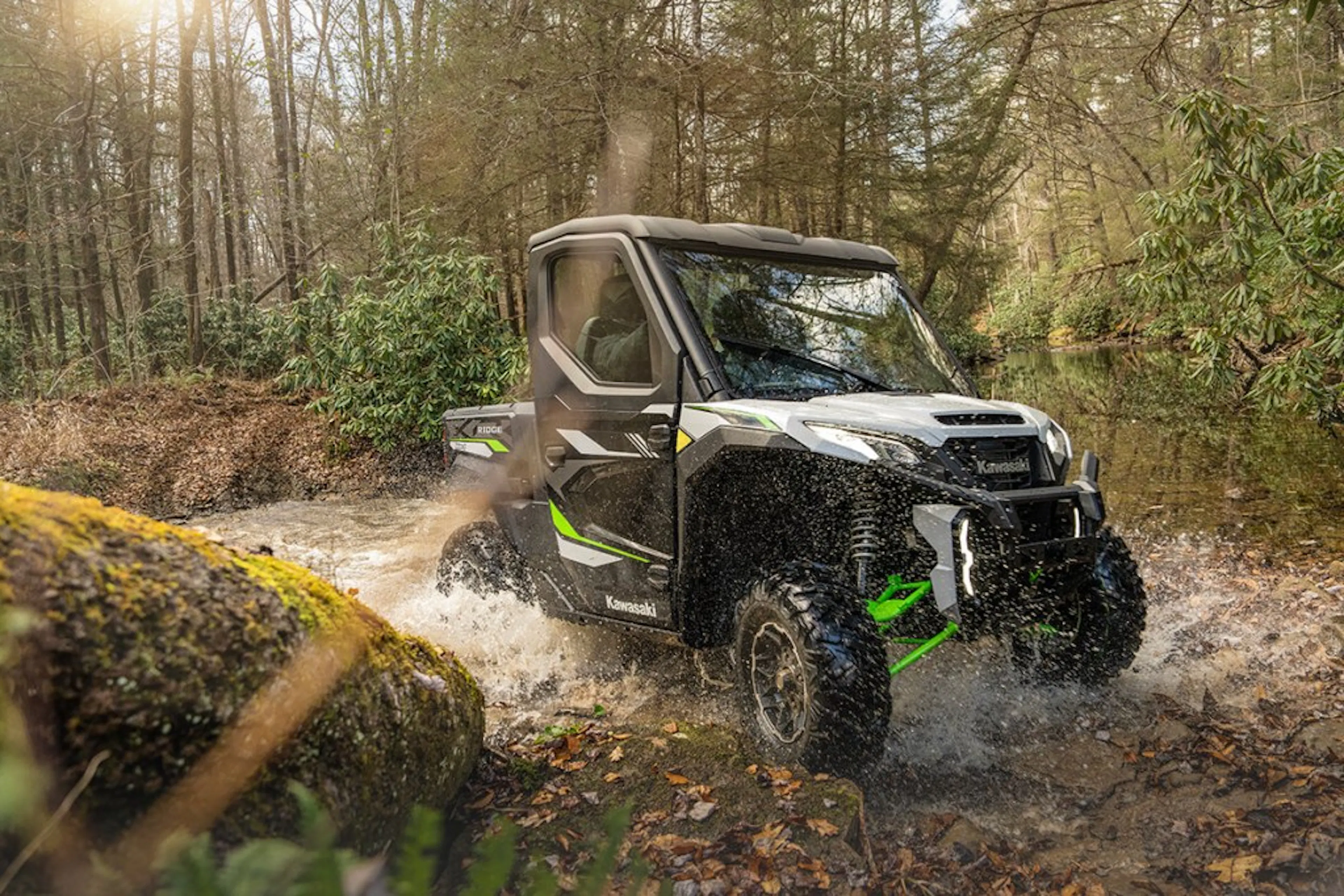 2025 Kawasaki Ridge XR crossing a stream.