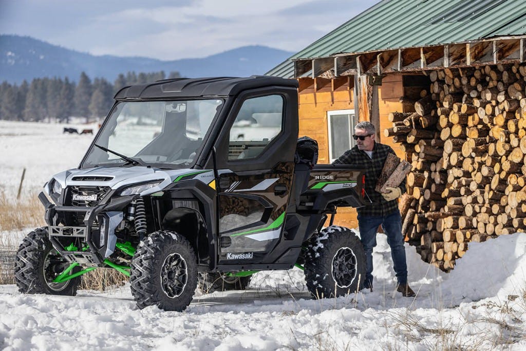 2025 Kawasaki Ridge XR being loaded with firewood.